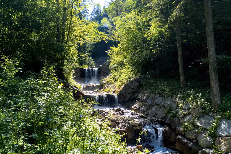 A waterfall close to the path.