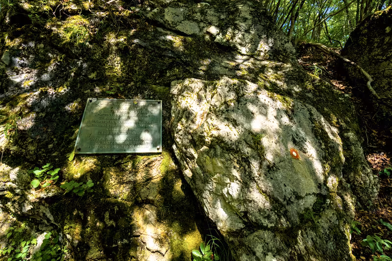 A memorial alongside the path.