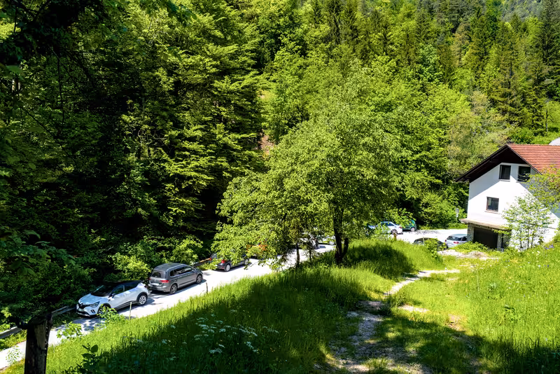 The still busy parking lot at the start of the path comes into view.